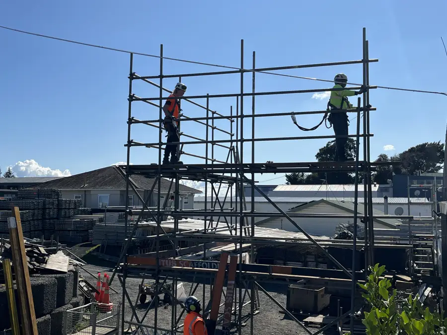 Scaffold platforms providing access along a house exterior