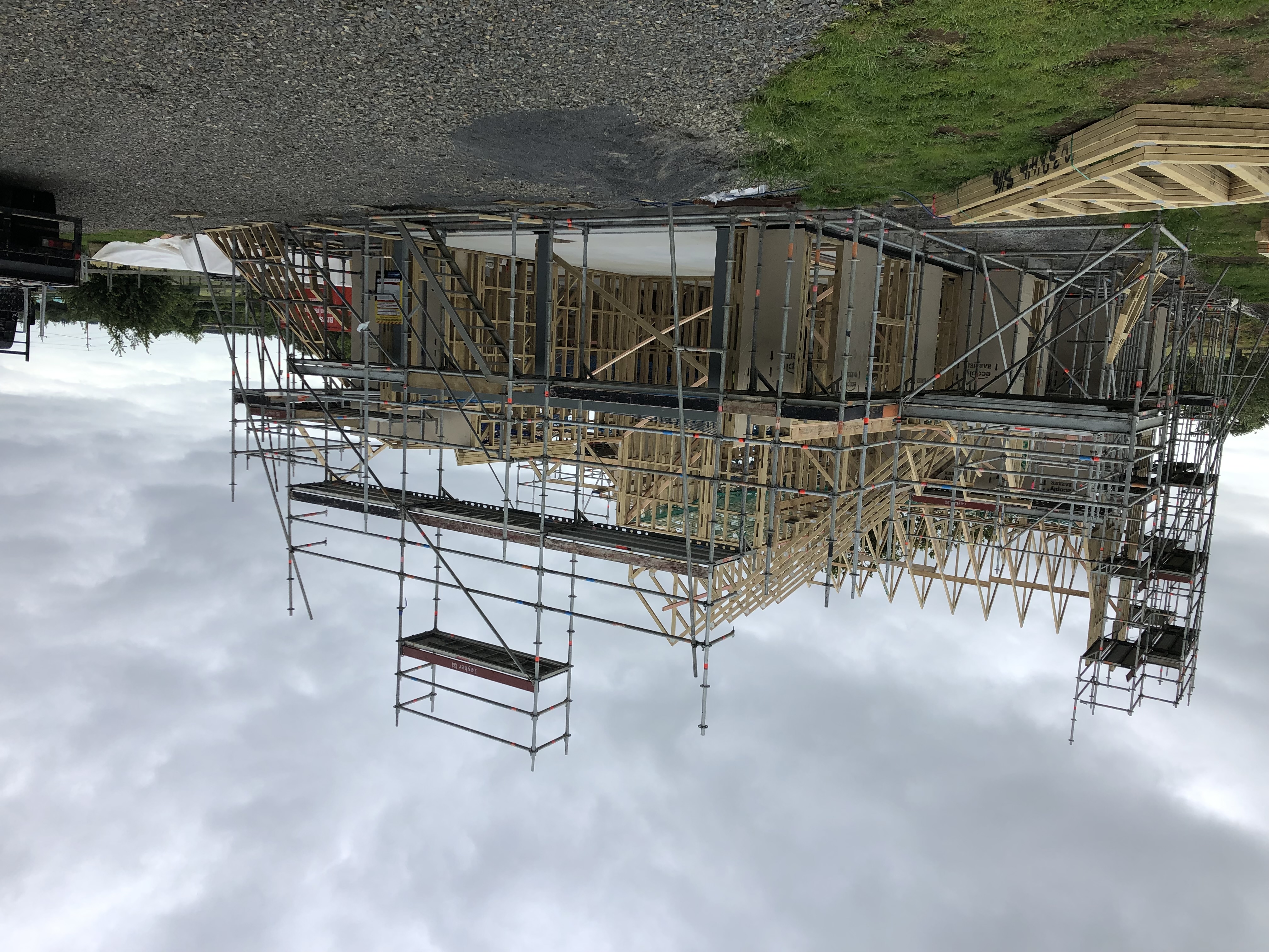 Residential scaffolding around a new home frame